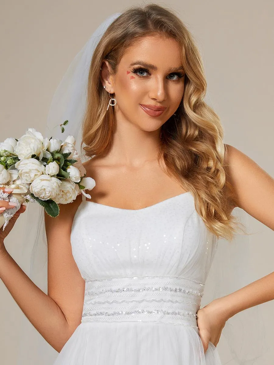 Robe de mariée classique en tulle à bretelles spaghetti réglables avec chaîne à paillettes à la taille