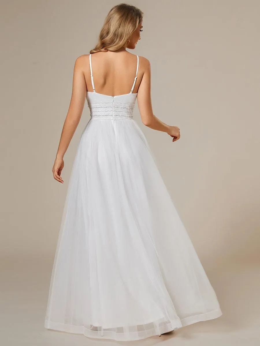 Robe de mariée classique en tulle à bretelles spaghetti réglables avec chaîne à paillettes à la taille