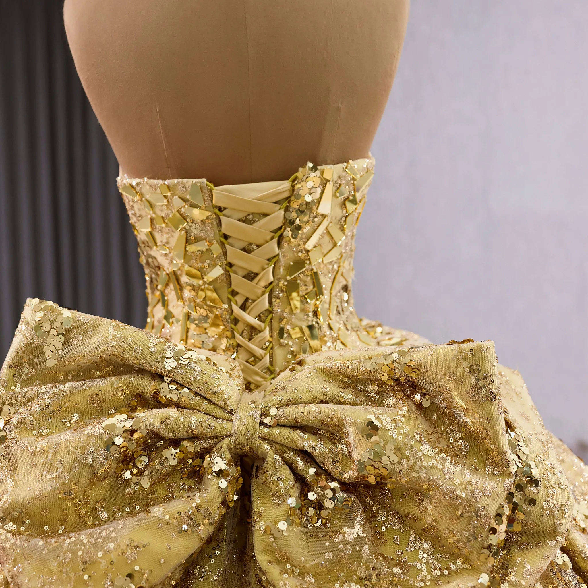 Strapless Gold Sparkly Princess Quinceañera Ball Gown with Bowknot